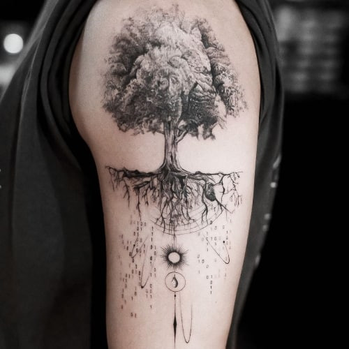 Nature scene tattoo on the leg with mountains and trees, representing outdoor men tattoo ideas.