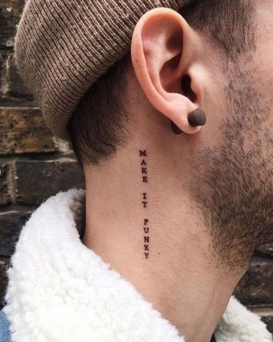 Word neck tattoo for men with a vertical script