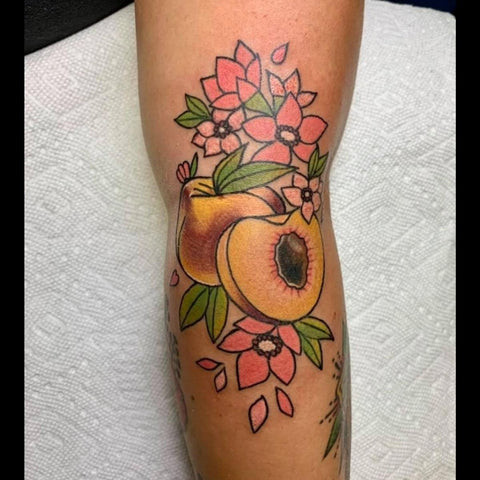 Neo Traditional Peach Tattoo with Finer Lines and Varied Colors