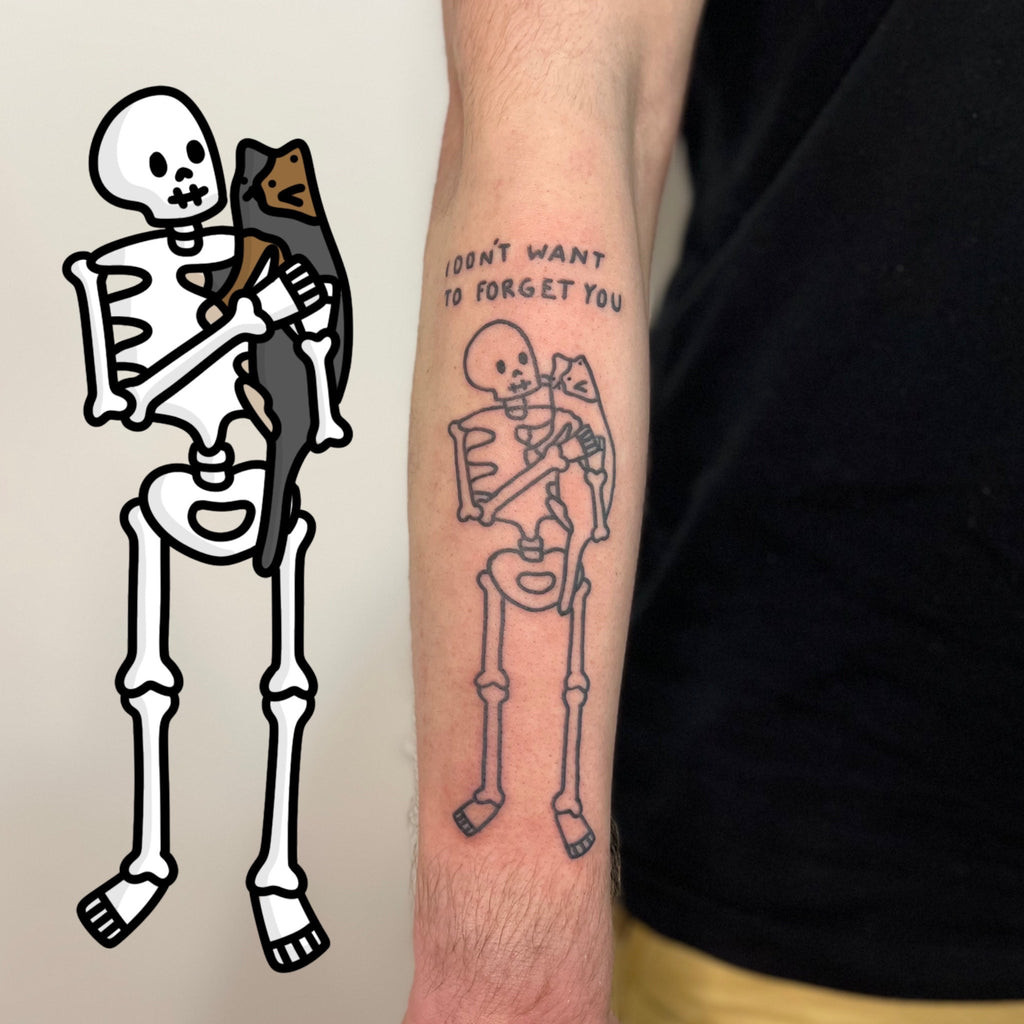 Simple black line art skeleton tattoo on arm