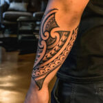 Geometric simple forearm tattoo for men