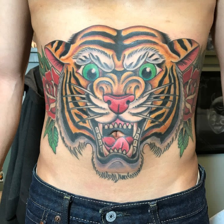 Display of diverse tattoo art styles at Great Lakes Tattoo shop