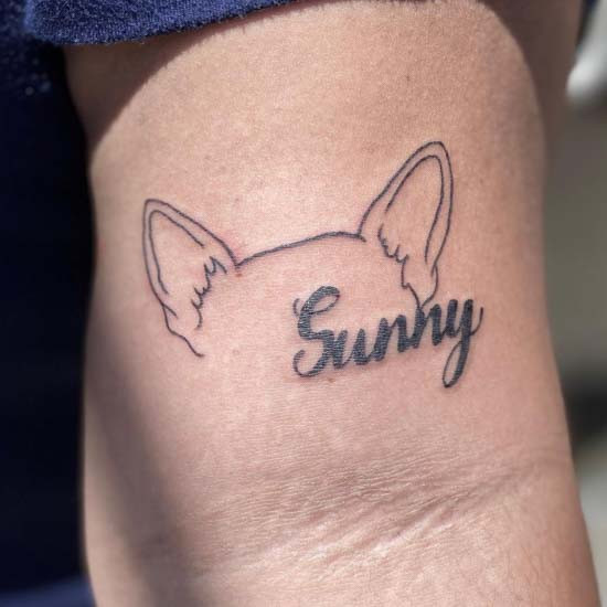 Pet dog ears line tattoo with delicate lines