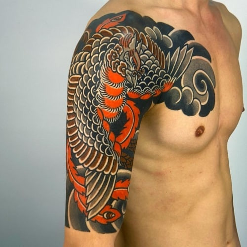 Two phoenix tattoos on men, one on the chest with a stylized phoenix and flames and another on the shoulder with a geometric phoenix pattern.