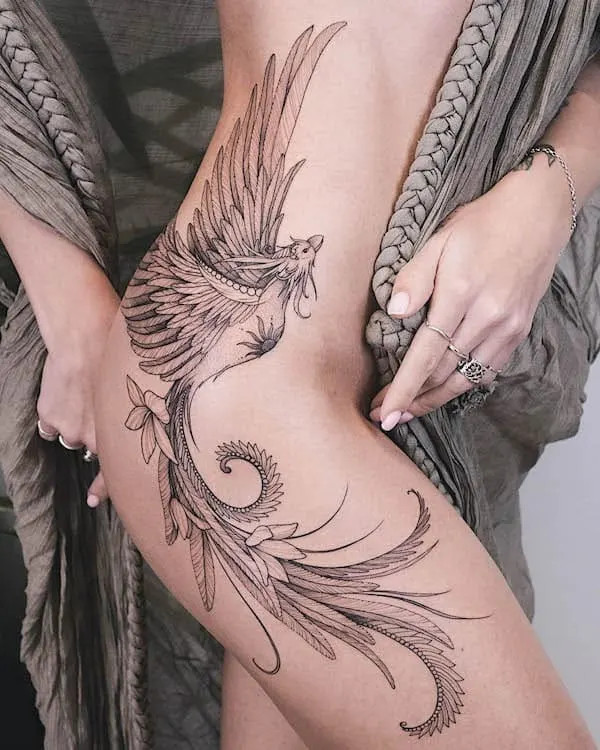 Intricate phoenix tattoo design on woman