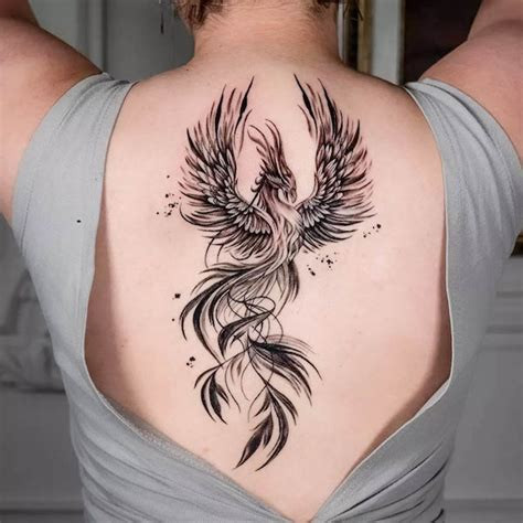 Phoenix tattoos designed for women, featuring delicate lines, softer colors, and floral or feminine elements.