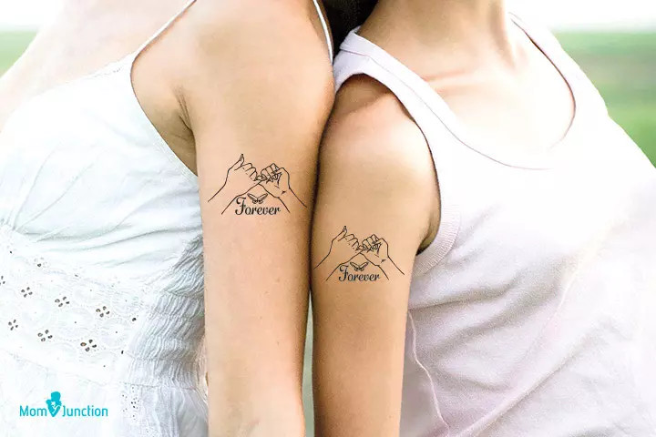 Pinky promise mother-daughter tattoo, symbolizing forever bond