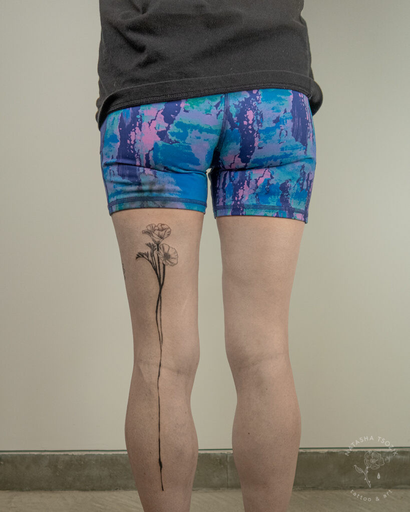 Poppy tattoo on a leg by Natasha Tsozik 2