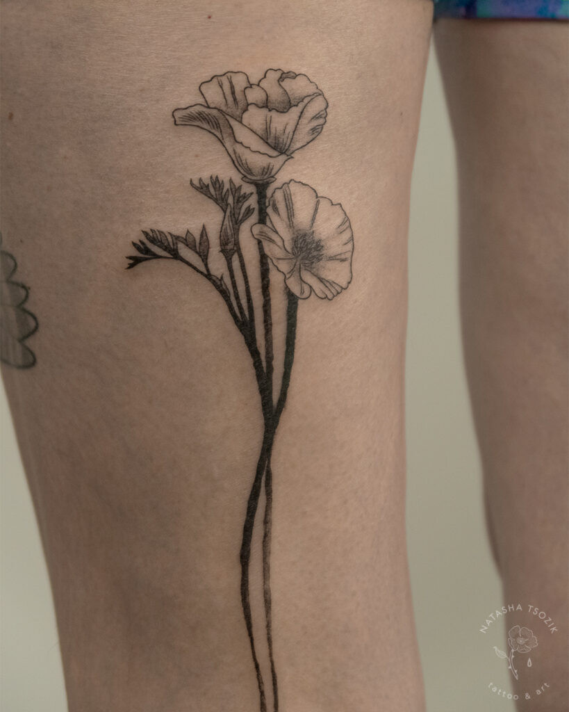 Poppy tattoo on a leg by Natasha Tsozik