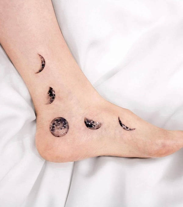 Realism moon phase foot tattoo on the side of the foot, a unique placement highlighting the moon's cycle in detail