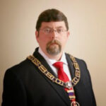Allen W. Record, owner of Doc Holliday Tattoo in Utah and prominent member of the Utah Masonic community, pictured in Masonic regalia