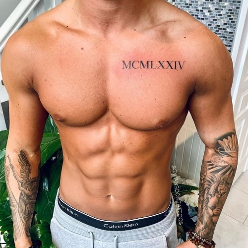 Roman numeral date tattoo on a man's wrist