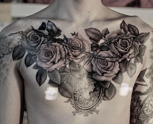Grand rose chest tattoo for statement