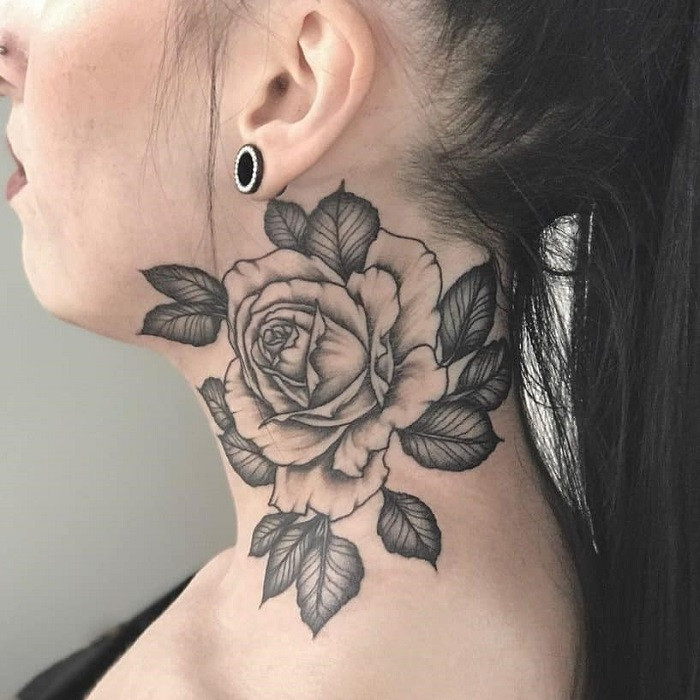 Single stem rose neck tattoo extending from behind the ear down the neck, elegant and elongated design.