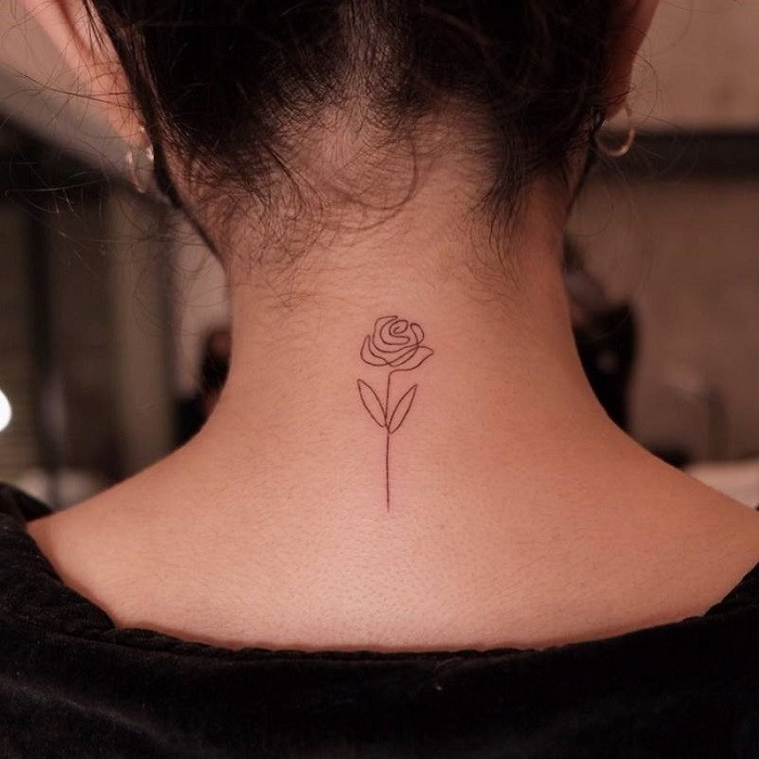 Floral wreath rose tattoo on the neck, encircling the area with roses and foliage.