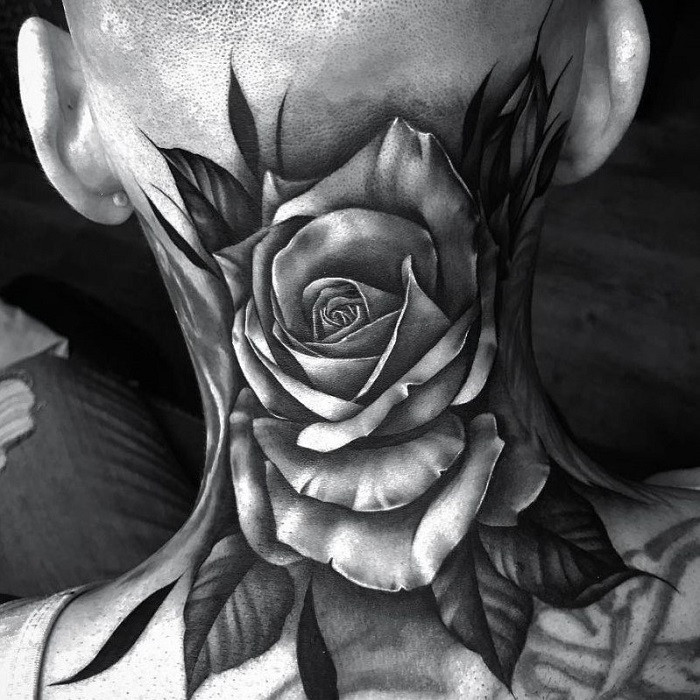 Sugar skull and rose tattoo on the neck, blending Dia de los Muertos imagery with rose symbolism.