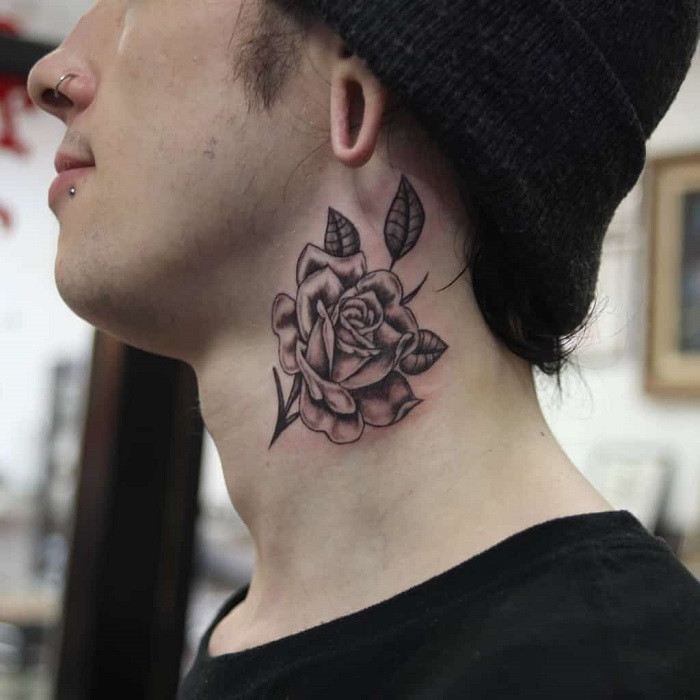 Traditional style rose neck tattoo with bold outlines and rich colors, classic tattoo aesthetic.