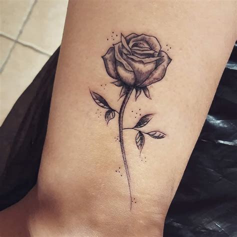 Neo-traditional rose tattoo with vibrant colors