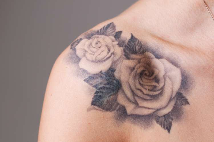 two roses tattoo on shoulder