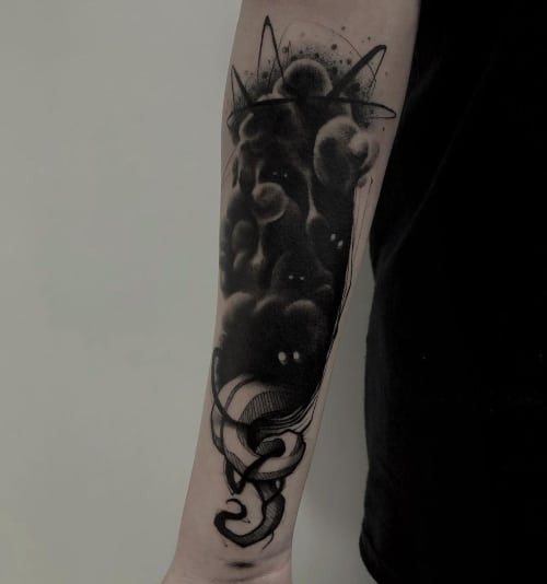 Two shadow tattoos on men, one on the forearm with a shadow wolf and another on the arm with a minimalist shadow figure outline.