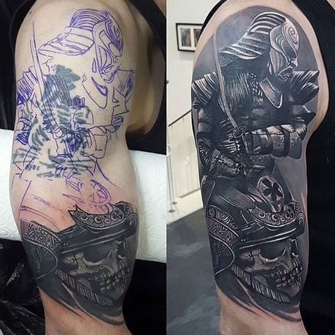 A vibrant floral cover-up tattoo on a man's shoulder, concealing a previous tattoo