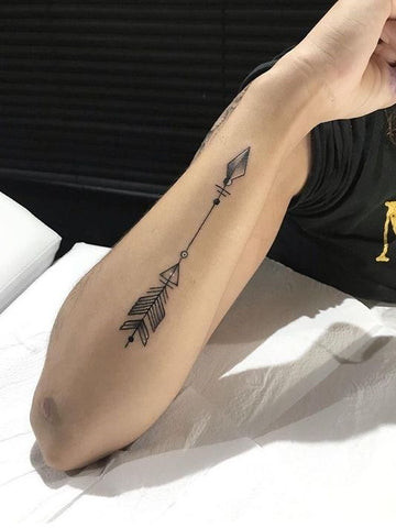 Arrow Arm Tattoo: Minimalist Direction Tattoo for Men