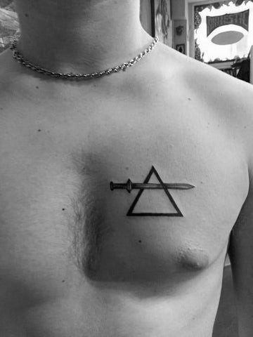 Sword Simple Chest Tattoos for Men: Sword Outline Chest Tattoo