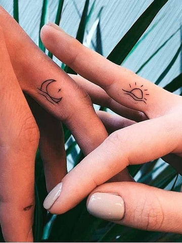 Sun and Moon Simple Hand Tattoos for Men: Celestial Hand Tattoos