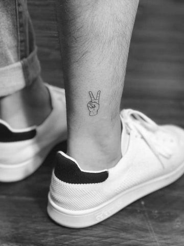 Peace Symbol Leg Tattoo: Simple Symbol Tattoo for Men