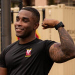 A Soldier from 325th Brigade Support Battalion demonstrating physical readiness after training, showcasing the evolving acceptance of tattoos in the U.S. Army under the updated policy.