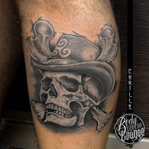 Realistic skull with cowboy hat tattoo with detailed shading