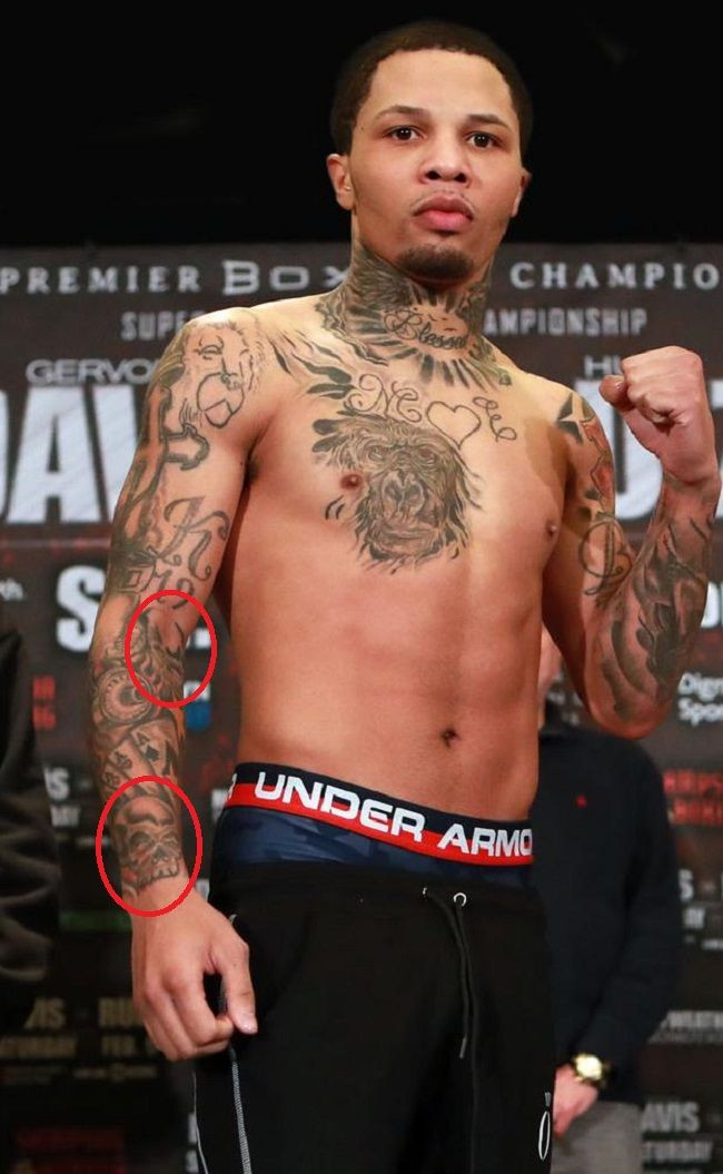 Gervonta Davis' skulls tattoo, possibly representing overcoming adversity and fearlessness.