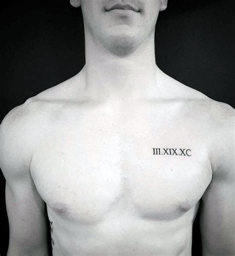 Man with a small chest tattoo