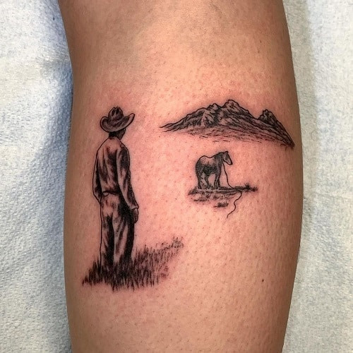 Small black ink cowboy hat tattoo on wrist