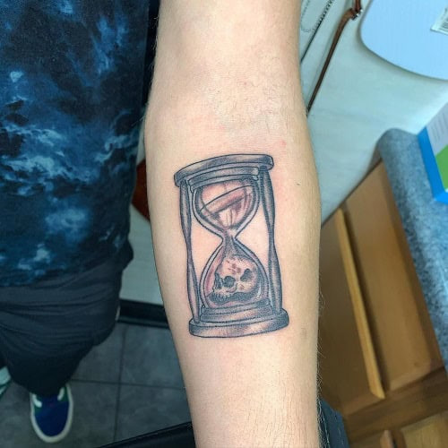 Minimalist Small Hourglass Tattoo on Forearm