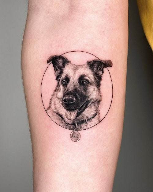 Small portrait tattoo in black and grey on a man's arm