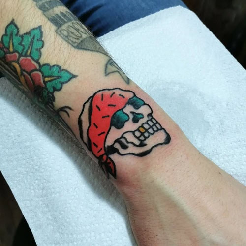 Classic Small Skull Tattoo on Hand