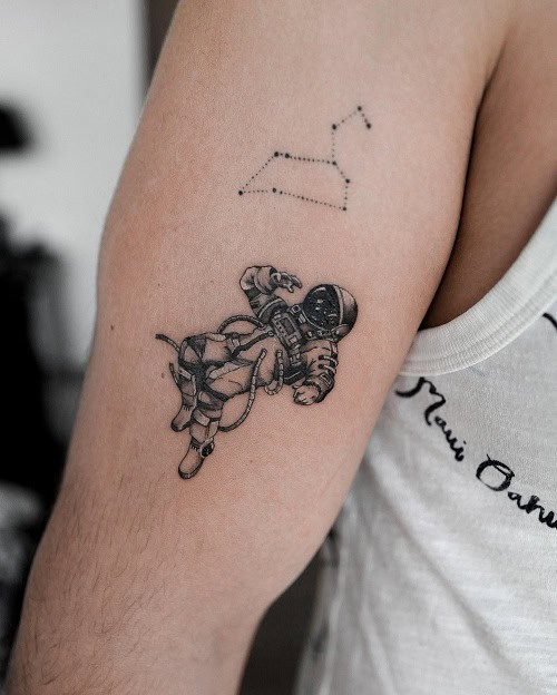 Small star constellation tattoo on a man's chest