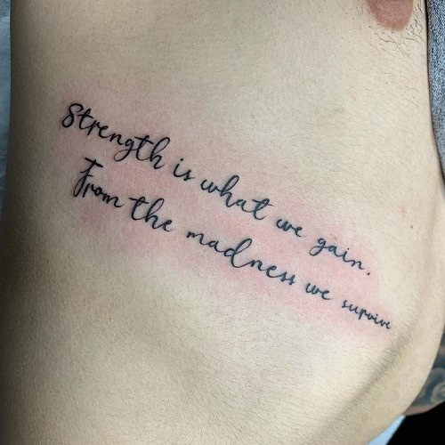 Elegant Small Lettering Tattoo on Collarbone