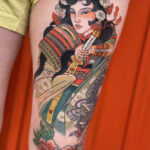 Miss Orange showcasing her intricate oriental tattoo art at Little Tokyo Studio in Sydney