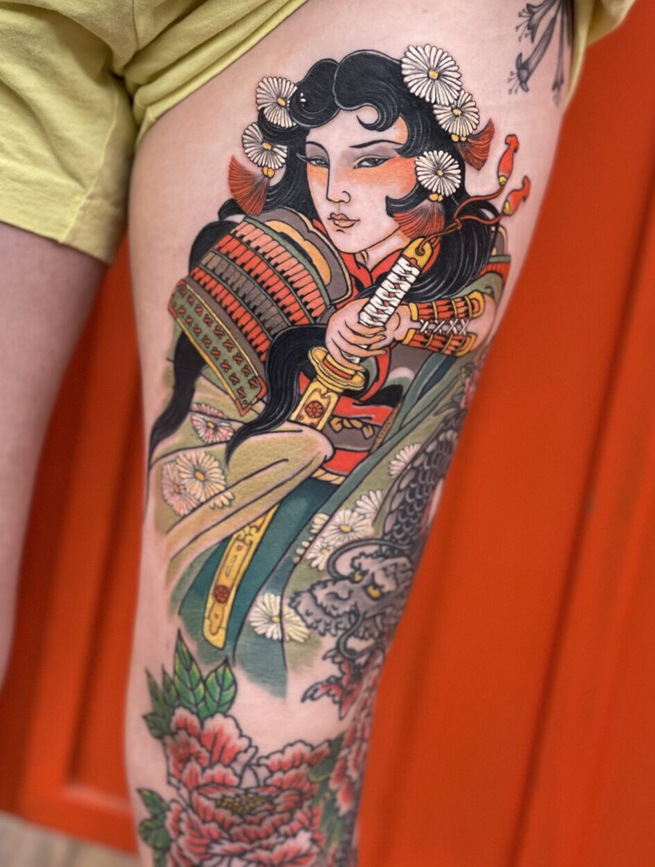 Miss Orange showcasing her intricate oriental tattoo art at Little Tokyo Studio in Sydney