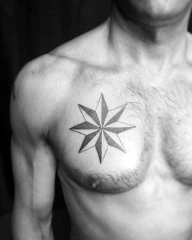 Man with a star chest tattoo featuring a cluster of stars across his chest