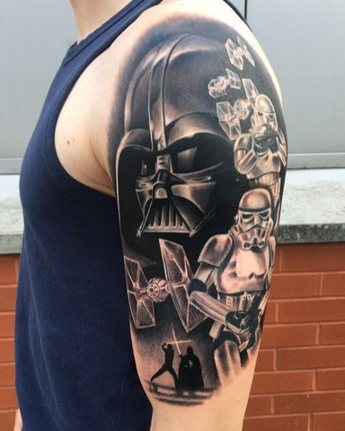 Star Wars sleeve tattoo featuring iconic characters and spaceships from the Star Wars universe