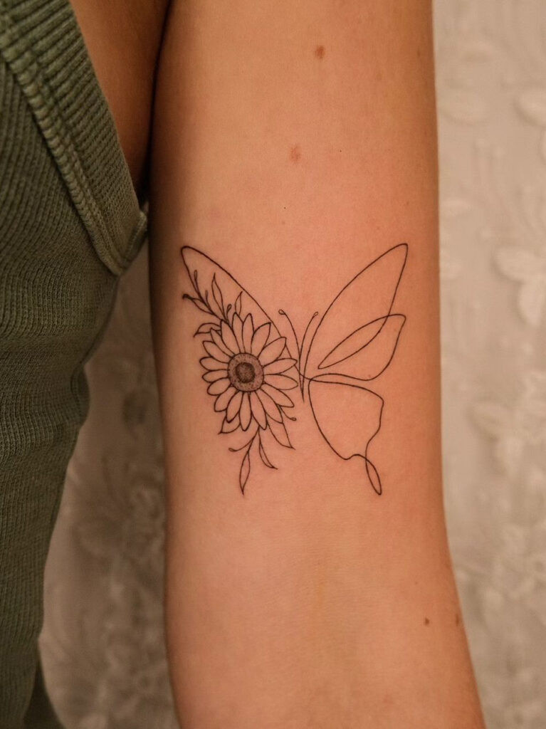 Sunflower butterfly illustration arm tattoo