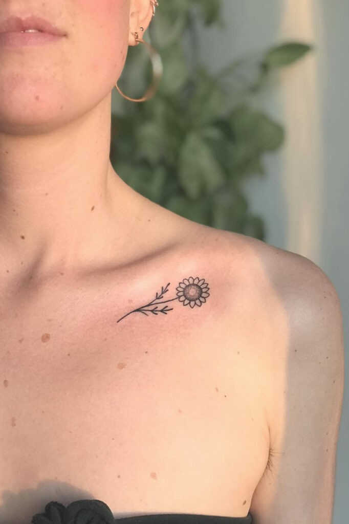 Cute sunflower collarbone tattoo