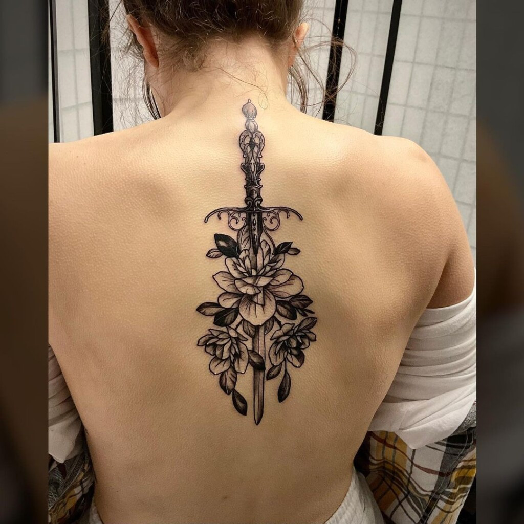 Sketch style sword tattoo design, mimicking the look of a hand-drawn sketch for a raw and artistic feel.