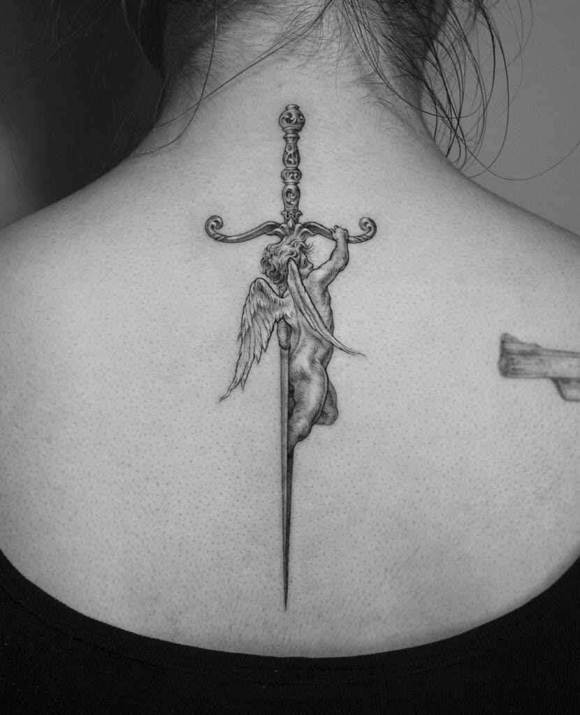Celtic sword tattoo design, incorporating Celtic knots and patterns for a culturally rich and symbolic representation of strength and heritage.
