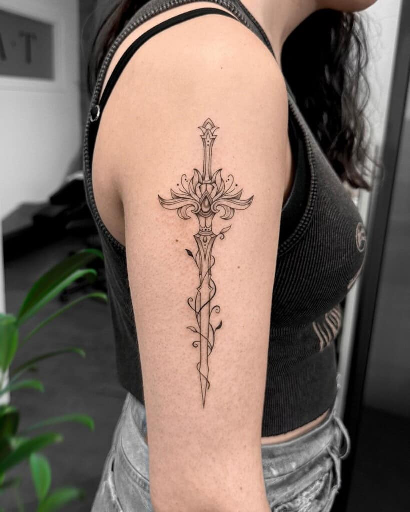 Hidden sword tattoo design, cleverly integrated into another image or pattern, adding an element of surprise and subtlety.