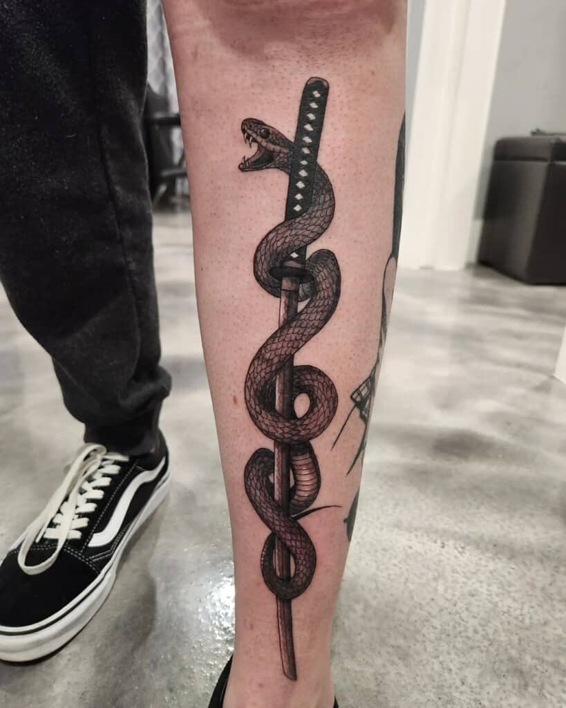 Dotwork sword tattoo design, using intricate patterns of dots to create texture and shading, offering a unique and delicate aesthetic.