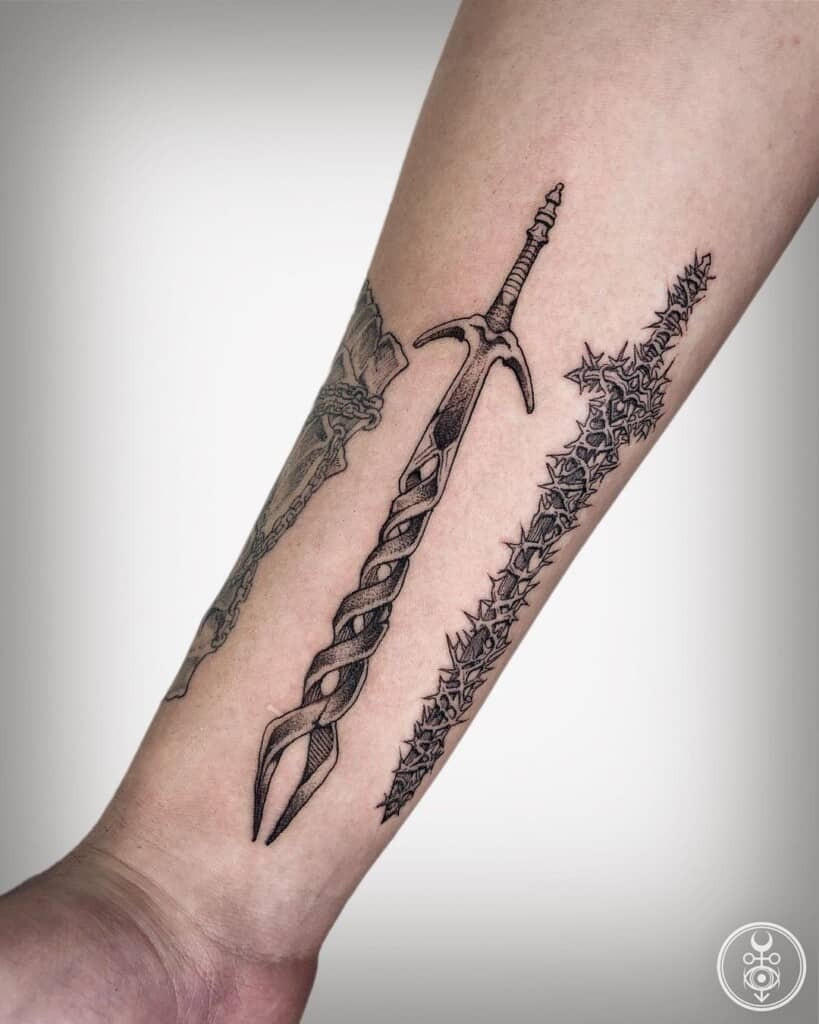 Sword and shield tattoo design, a classic combination symbolizing defense, protection, and readiness for battle.